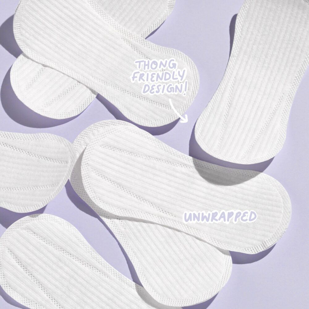 TOTM unwrapped liners laid on a lilac background, labelled as 'unwrapped' and 'thong friendly design'