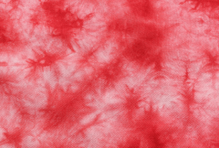 Pink and red tie dye pattern to represent bleeding during pregnancy